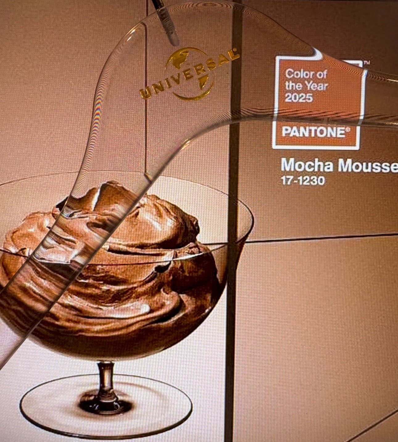 Rich chocolate mousse labeled “Mocha Mousse 17-1230” Pantone.