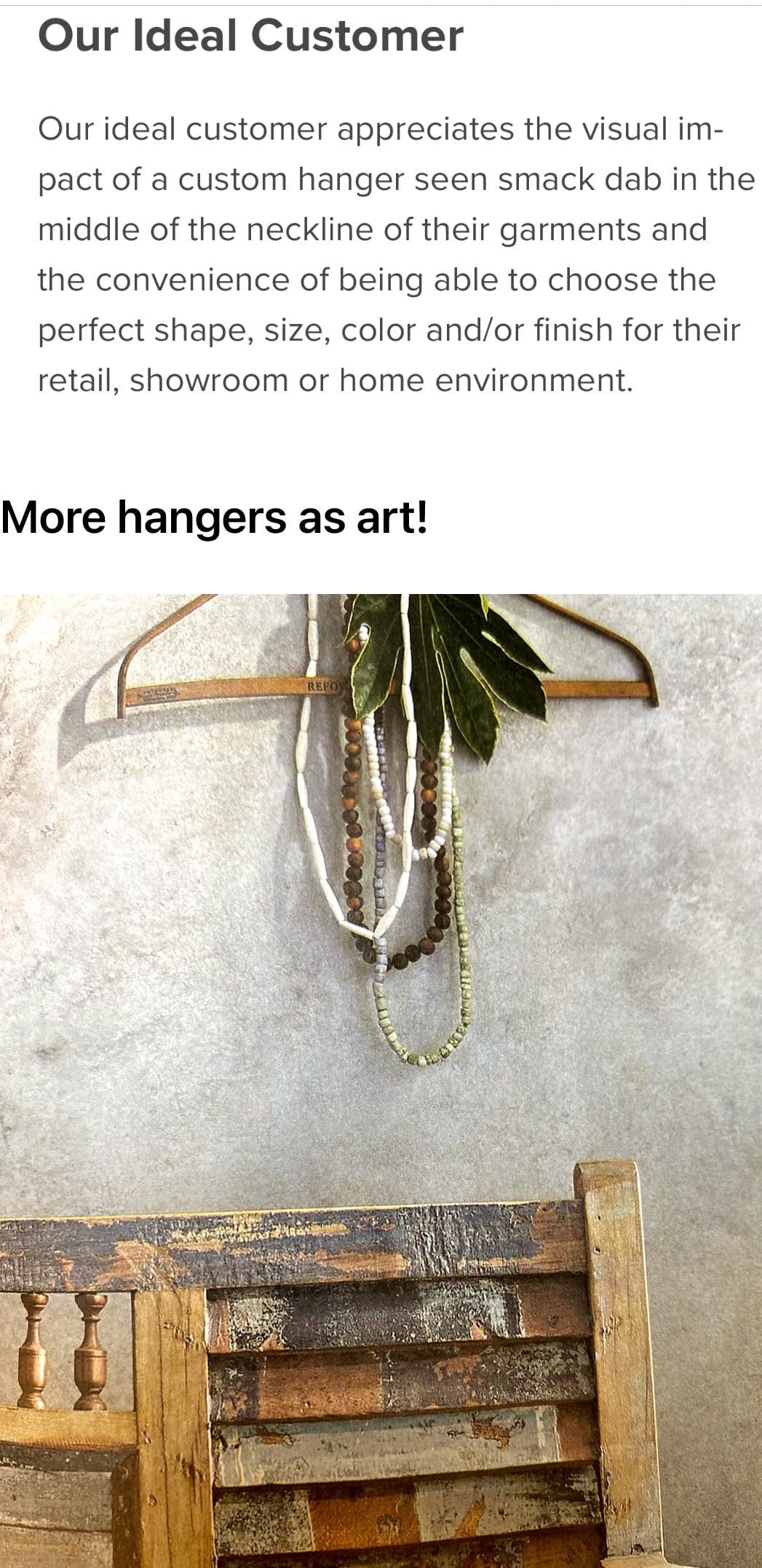 Custom hanger showcased with decorative beads and foliage against a textured background, highlighting its artistic and functional appeal for styling.