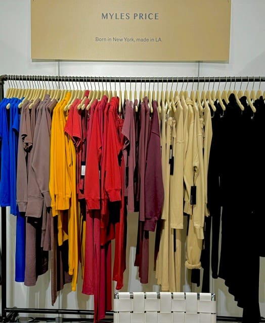 Colorful Myles Price t-shirts in blue, red, yellow, black.