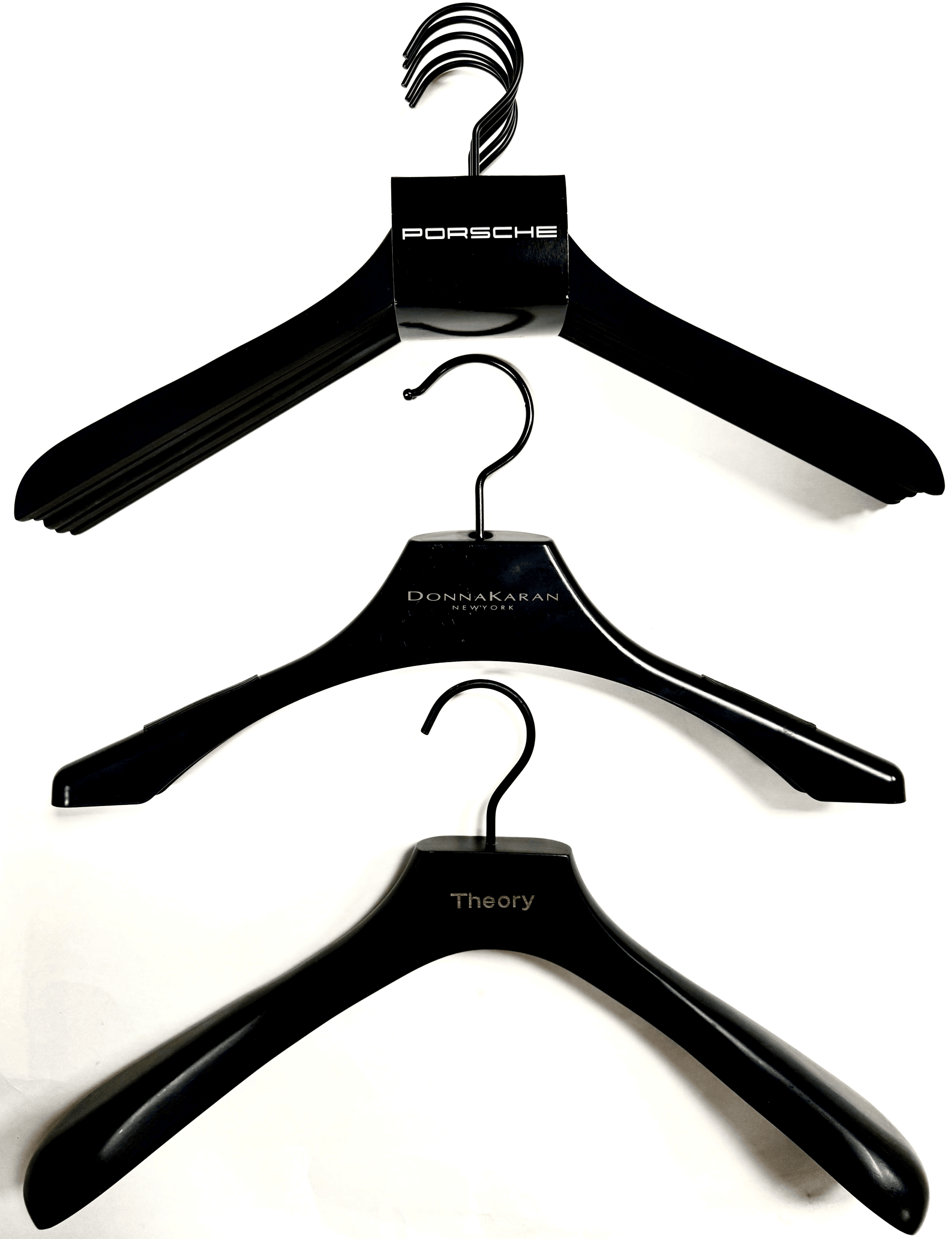 Three black hangers labeled Porsche, Donna Karan, and Theory.