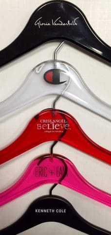 Colorful hangers display Gloria Vanderbilt, Champion, and Kenneth Cole.